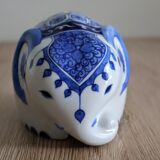 Elephant piggy bank to break in Thai ceramic