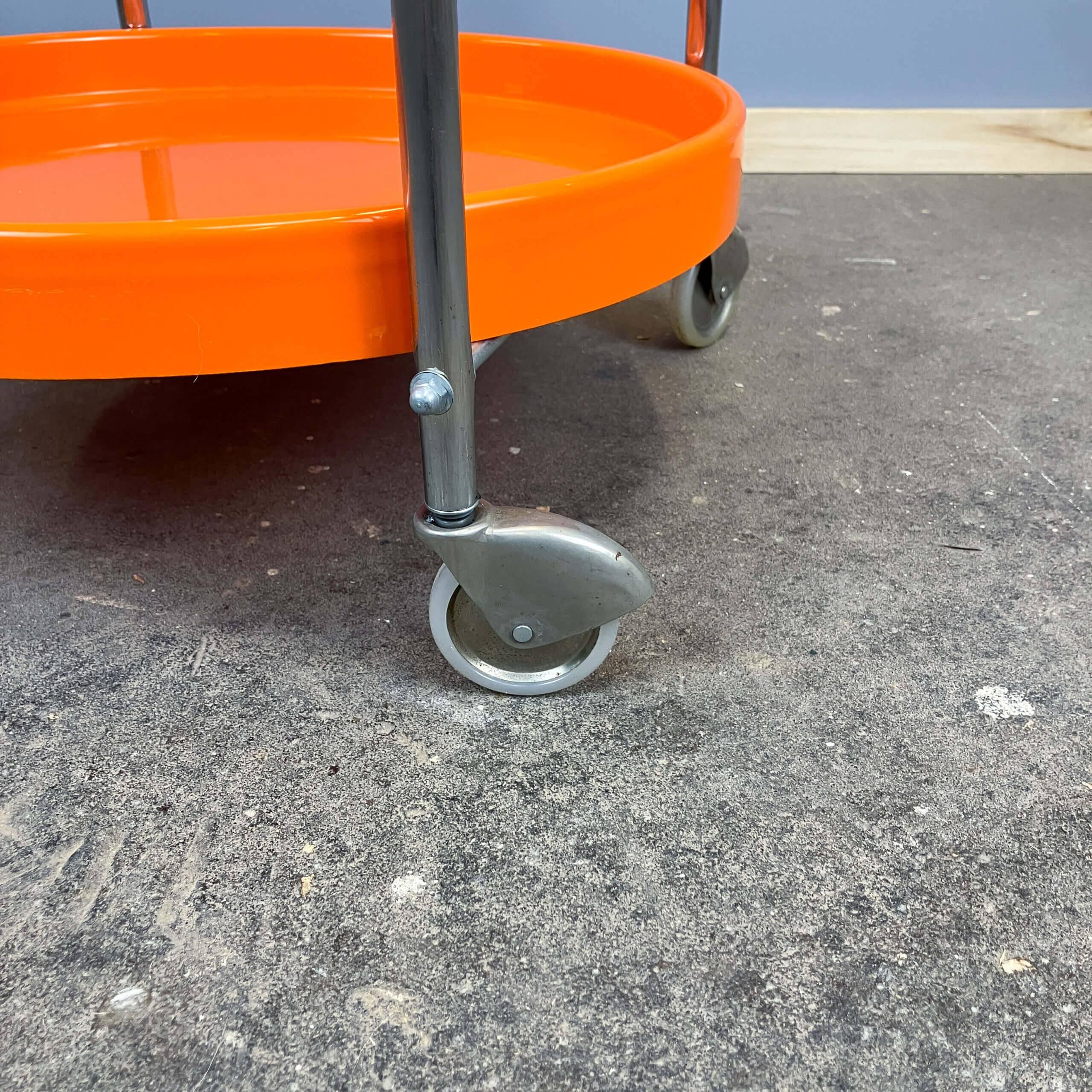 Space Age serving trolley, chrome and orange plastic trays, 1970s