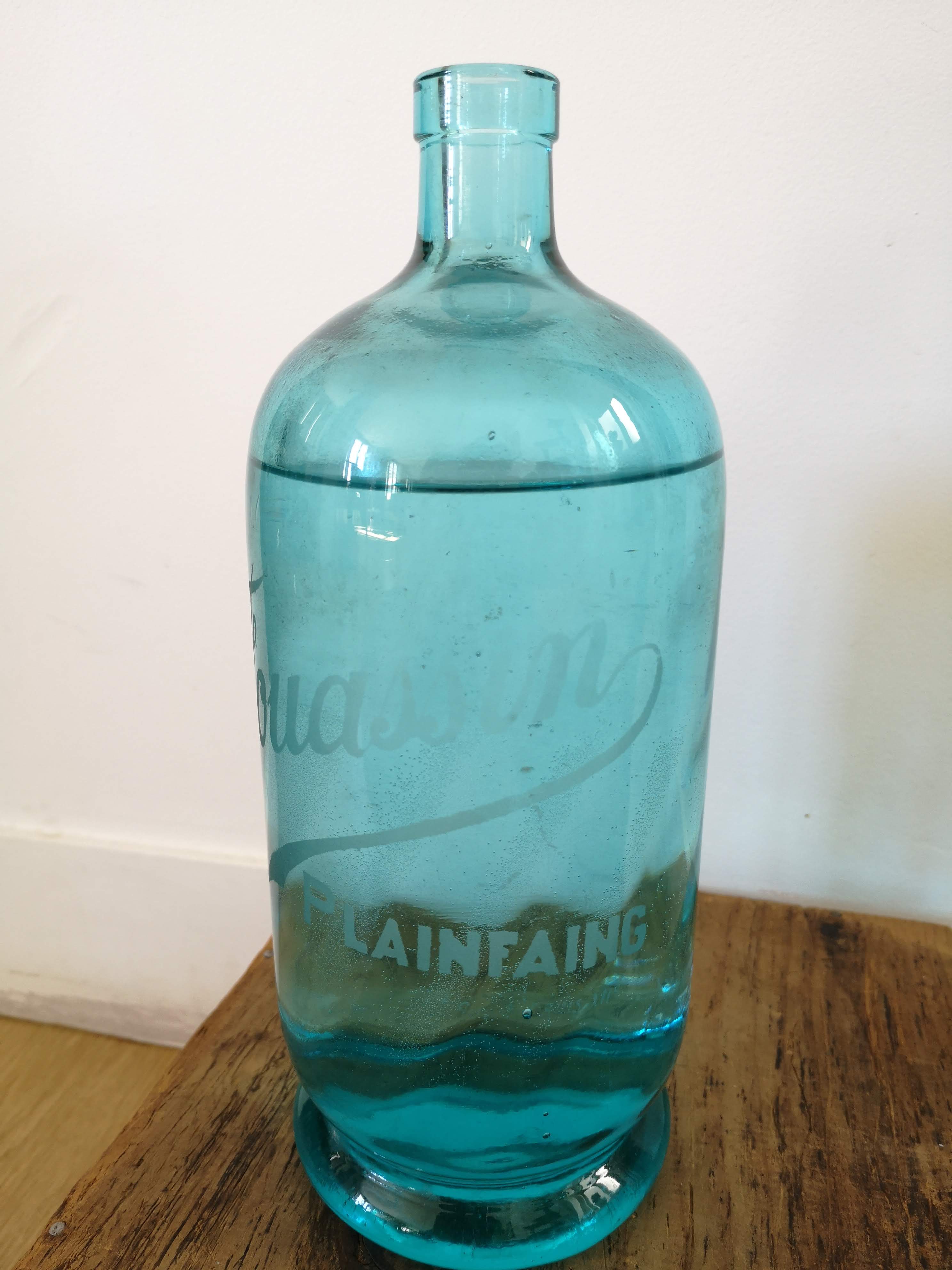 Blue jug out of a Seltzer siphon bottle