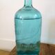 Carafe bleue issue d'une bouteille de siphon à eau de Seltz