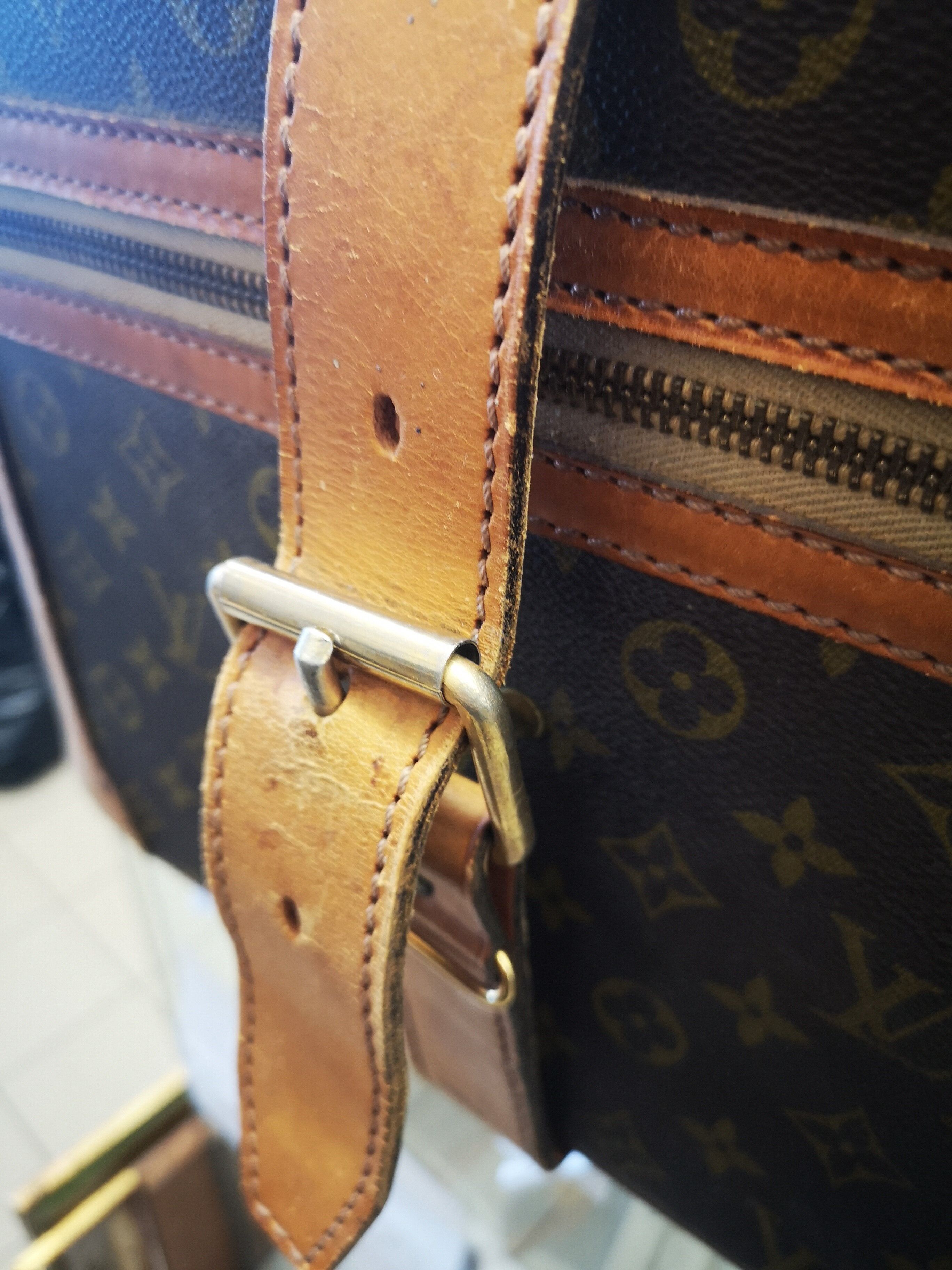Louis Vuitton leather suitcase
