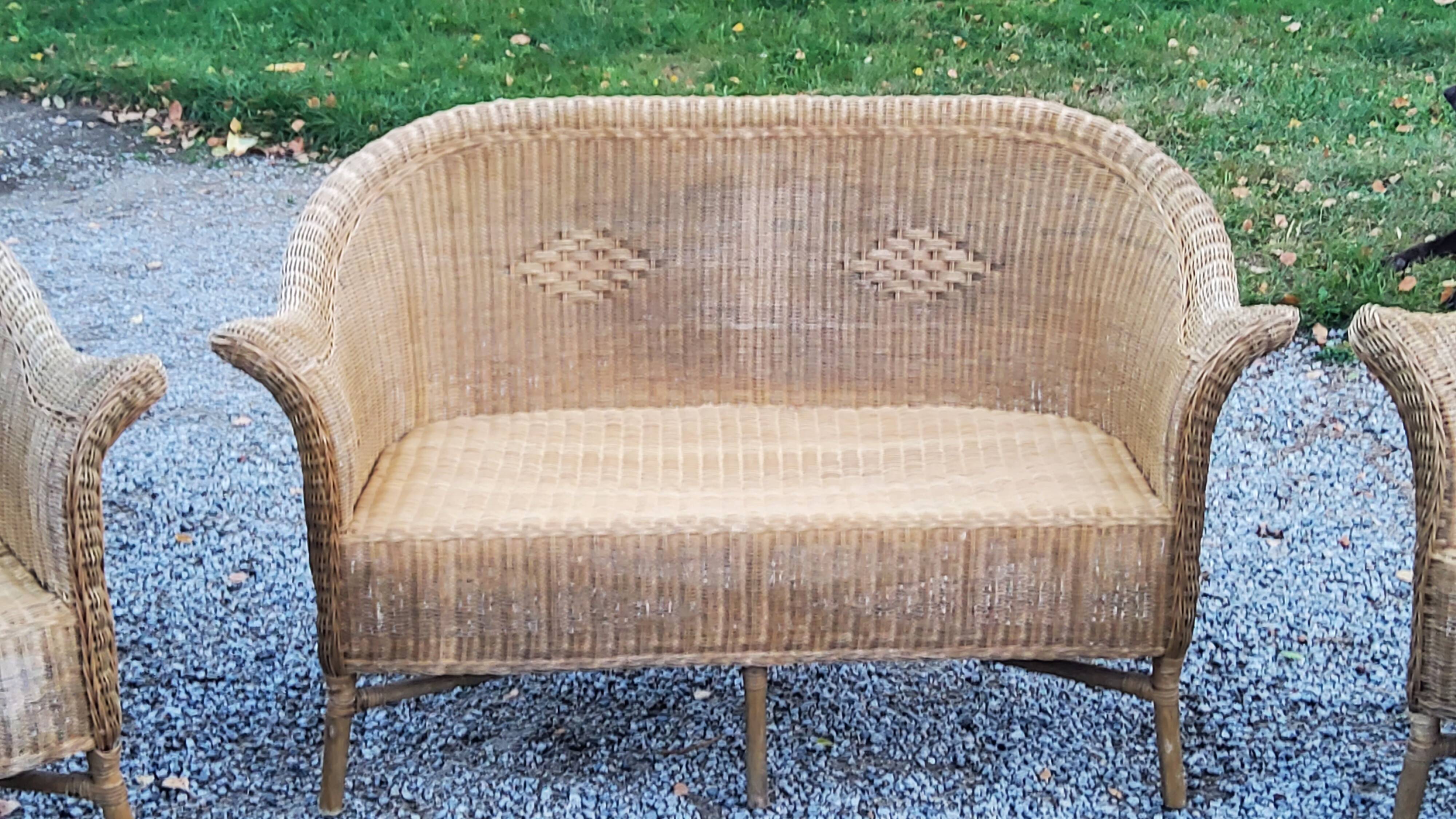 Pair of armchairs and bench in rattan and bamboo from the 60s/70s