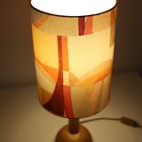 Wooden floor lamp with low printed shade