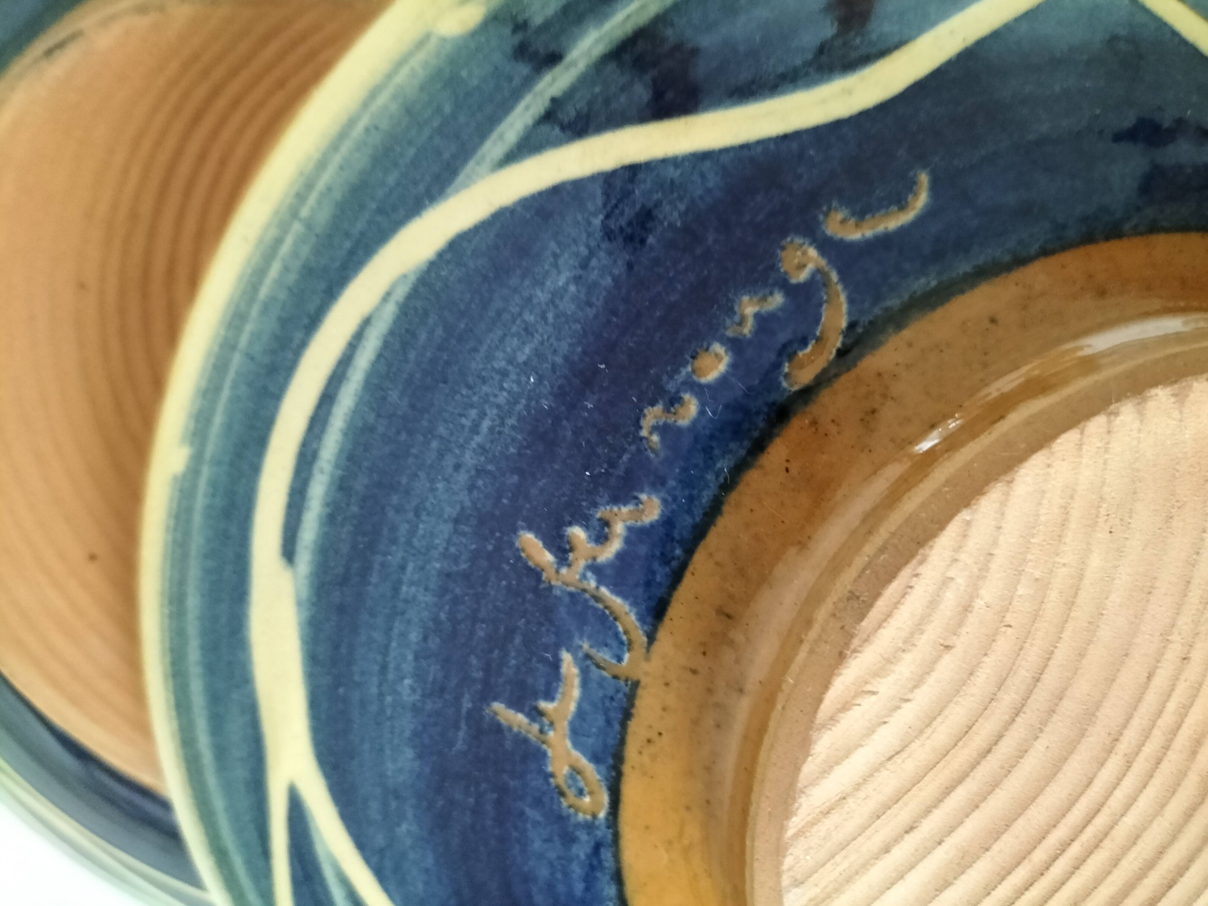 Pair of handcrafted bowls by Le Fer Rouge with blue and beige decor