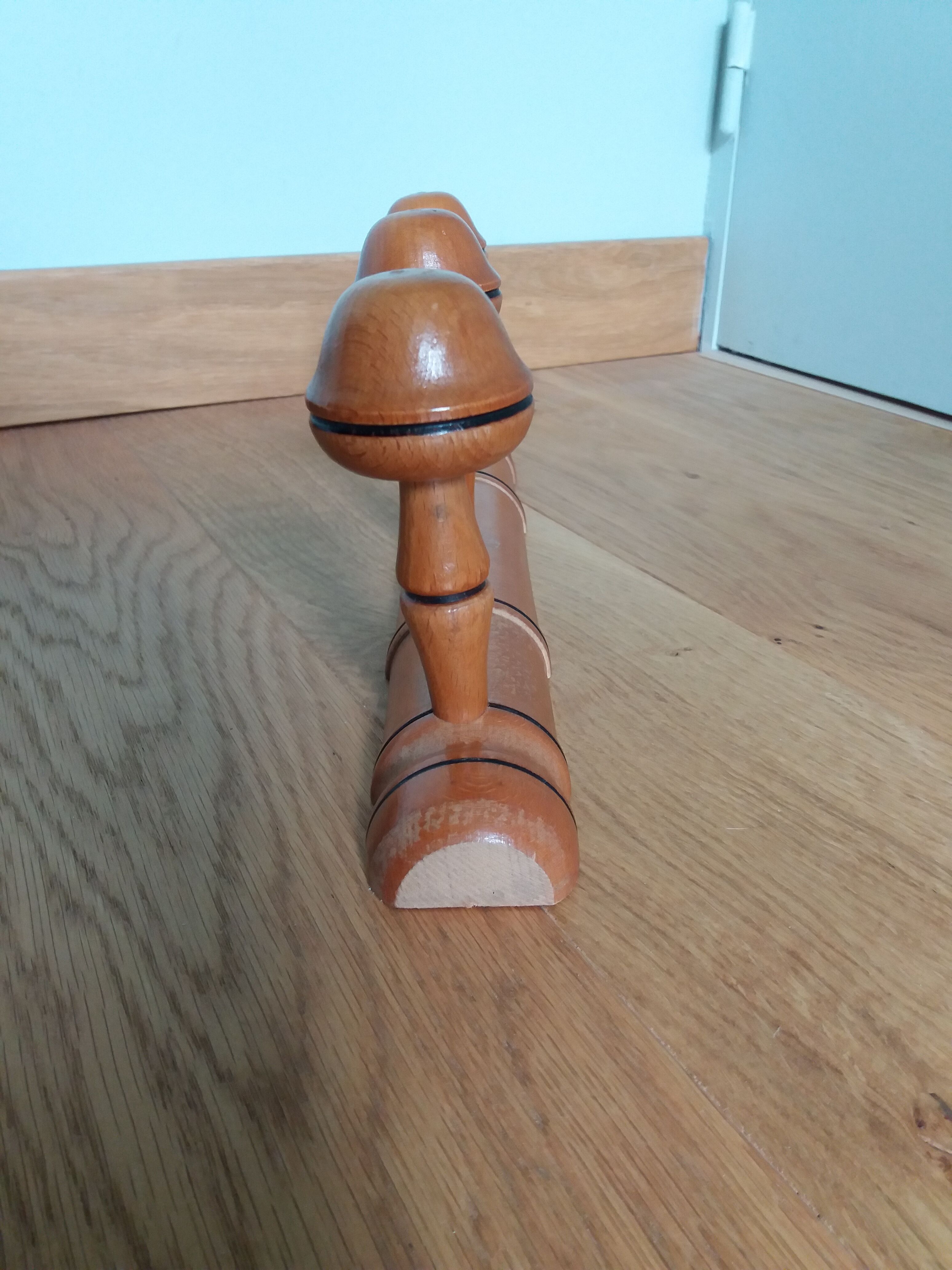 Bamboo-style wall coat holder with 3 mushroom hooks