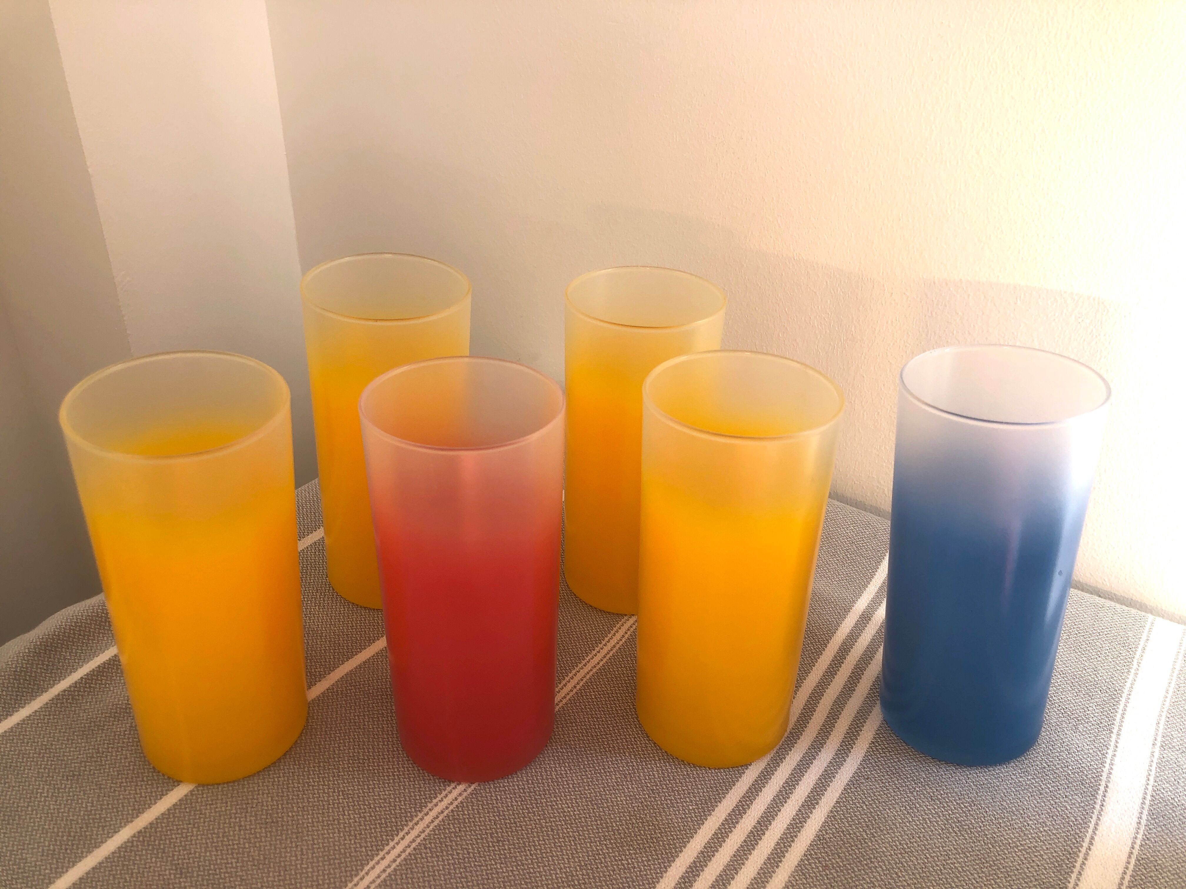 Yellow, red and frosted yellow orangeade glasses made of vintage glass