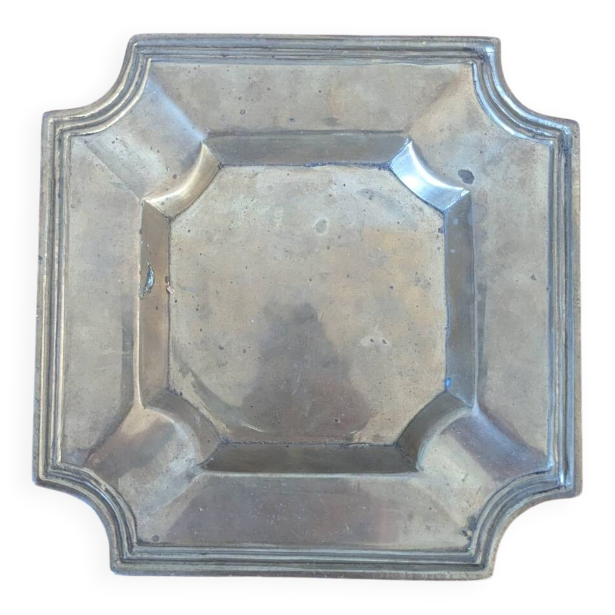 Brass pocket emptier