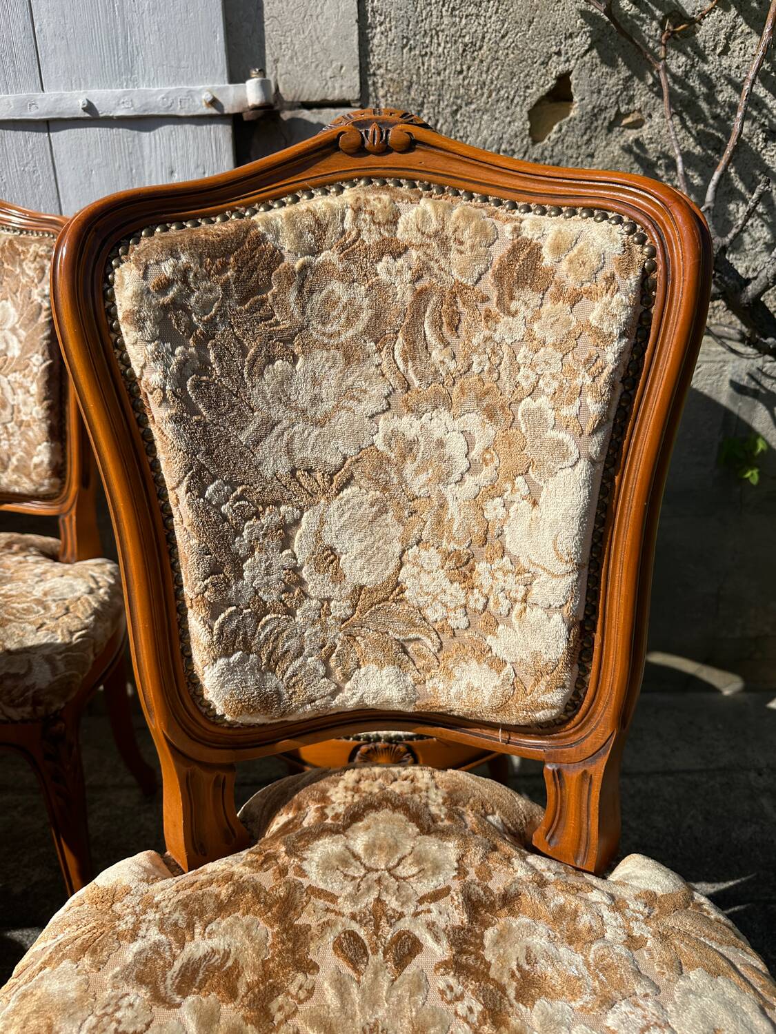 8 cherry wood chairs in Louis XV style with velvet upholstery.