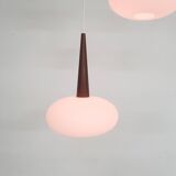 Set of three milk glass and teak pendant lights model NG74 by Louis Kalff for Philips, The Netherlan