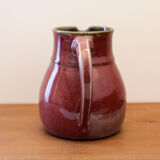 Signed enamelled ceramic pitcher