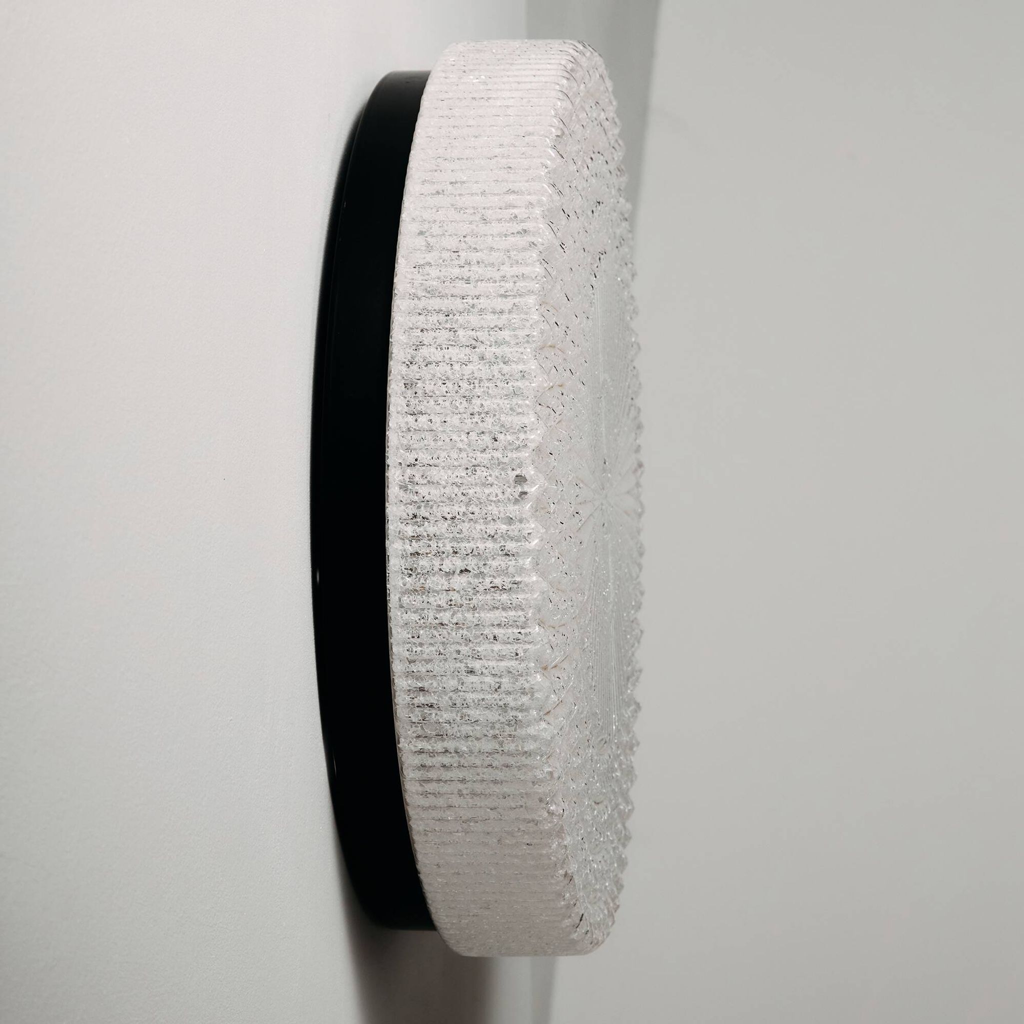 Wall light in metal and plastic