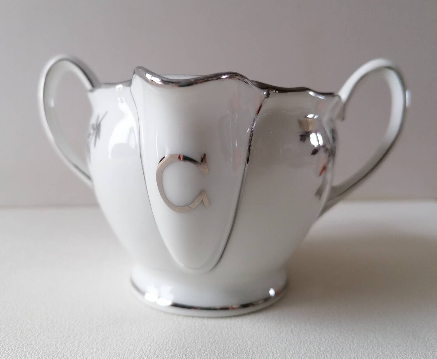 Limoges Maigre Gras porcelain sauce boat with silver decoration