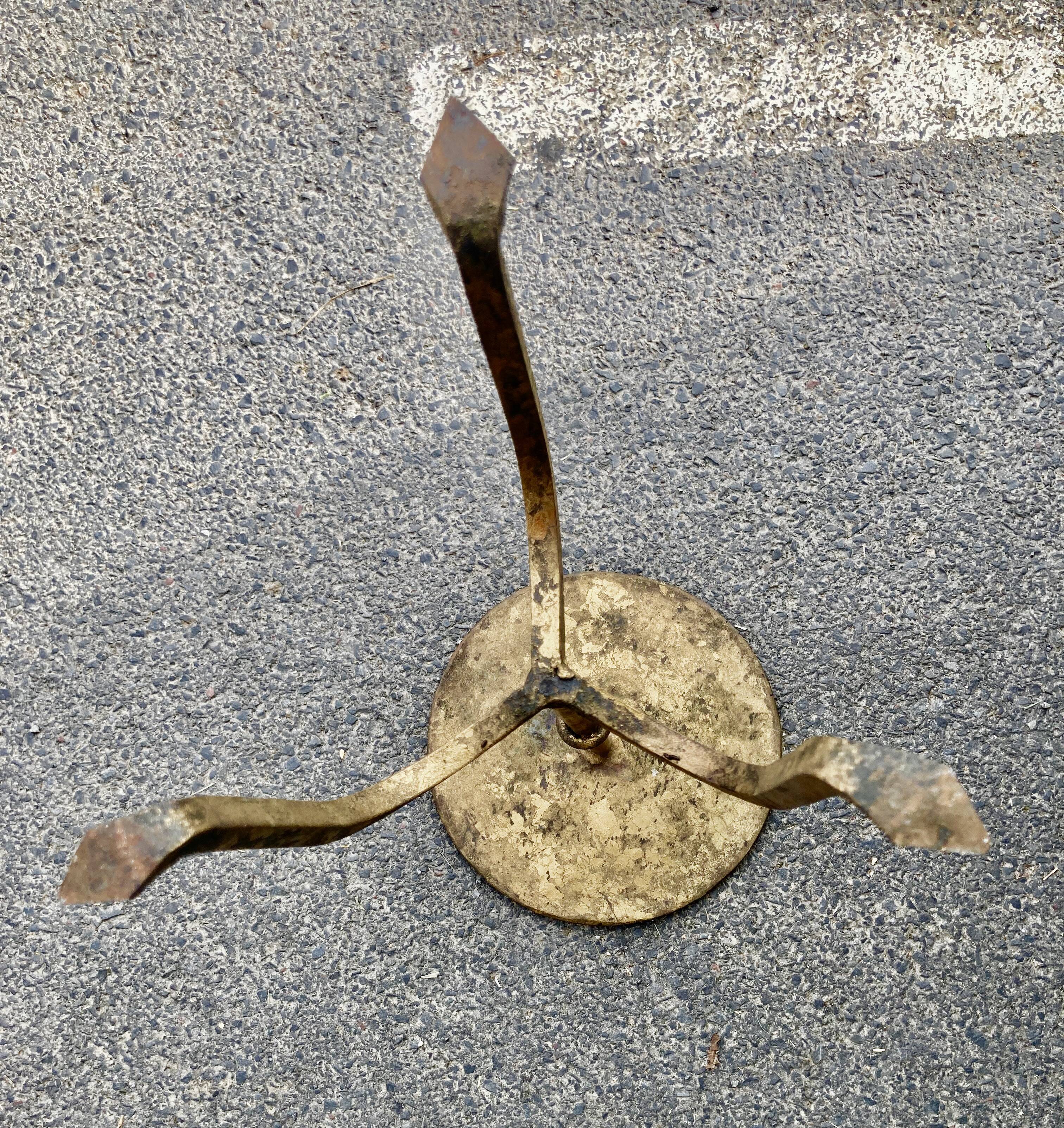 Henri POUENAT (1934-1987) Steel table or pedestal table with a golden patina