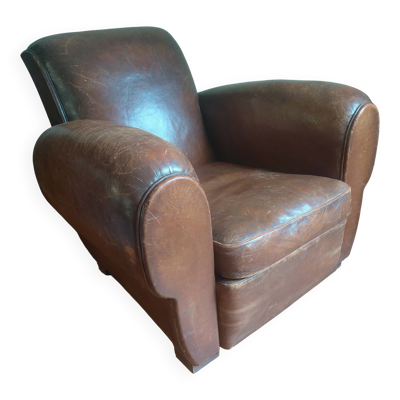 Fauteuil club,  cuir patiné
