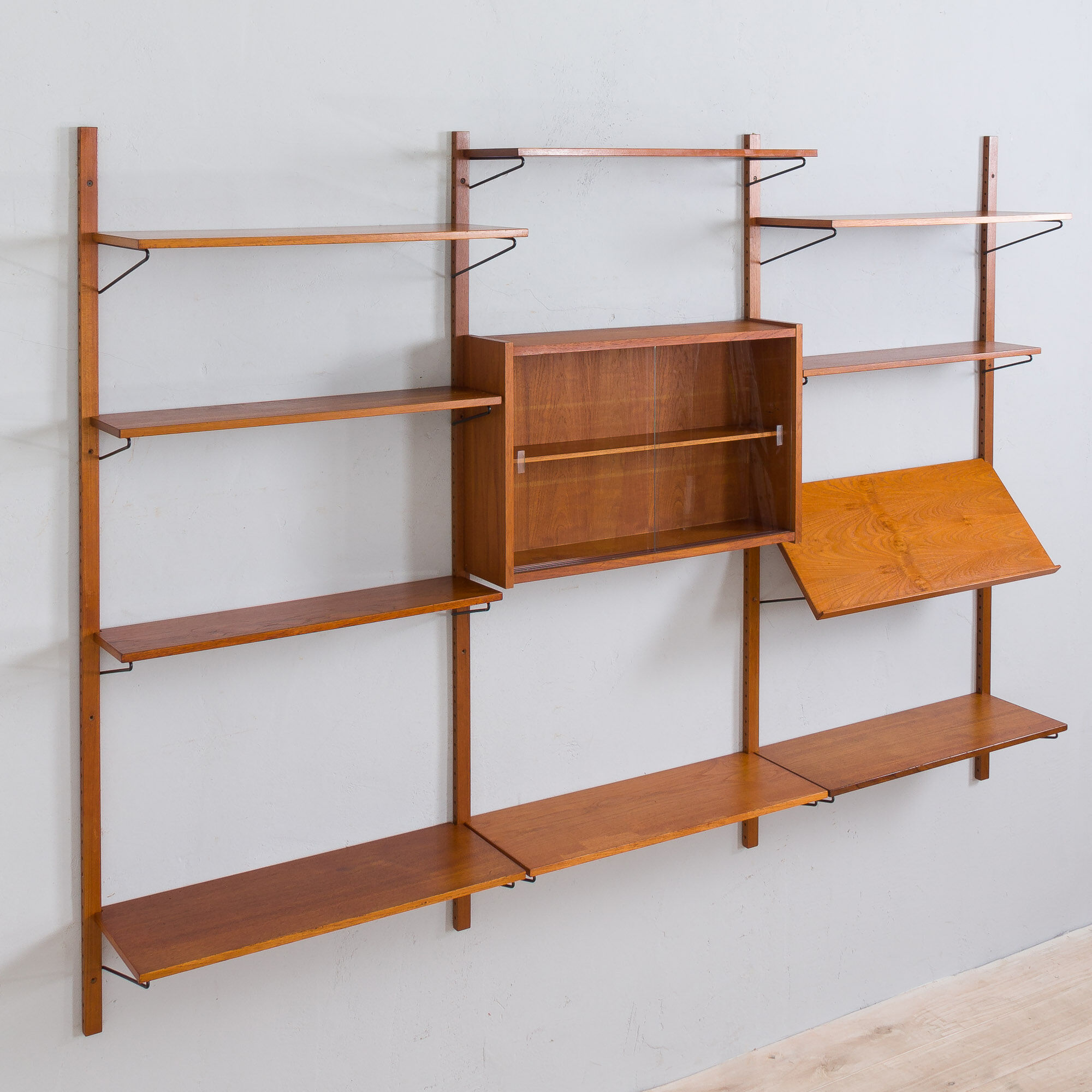 Danish mid century teak wall unit with magazine shelf and glass cabinet 1960/70s