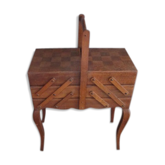 Worker on old wooden foot