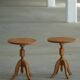 Pair of Scandinavian oak side tables with central legs and sculptural curved feet, 1960s.