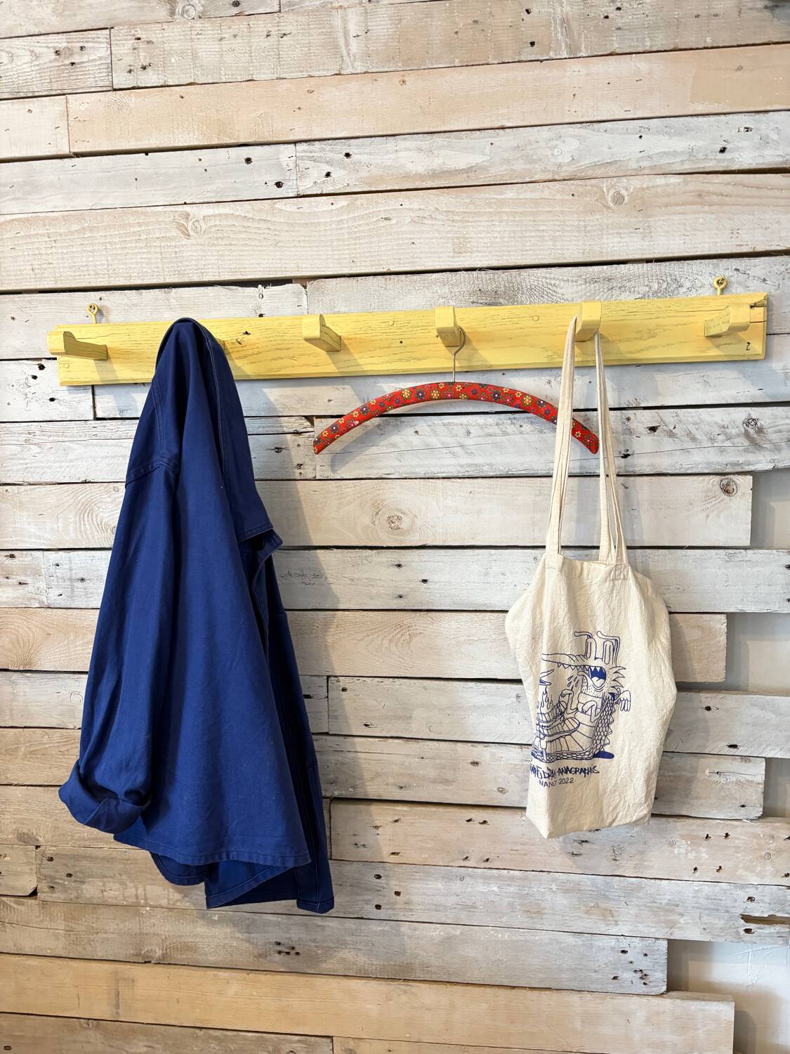 Antique lemon yellow coat hook