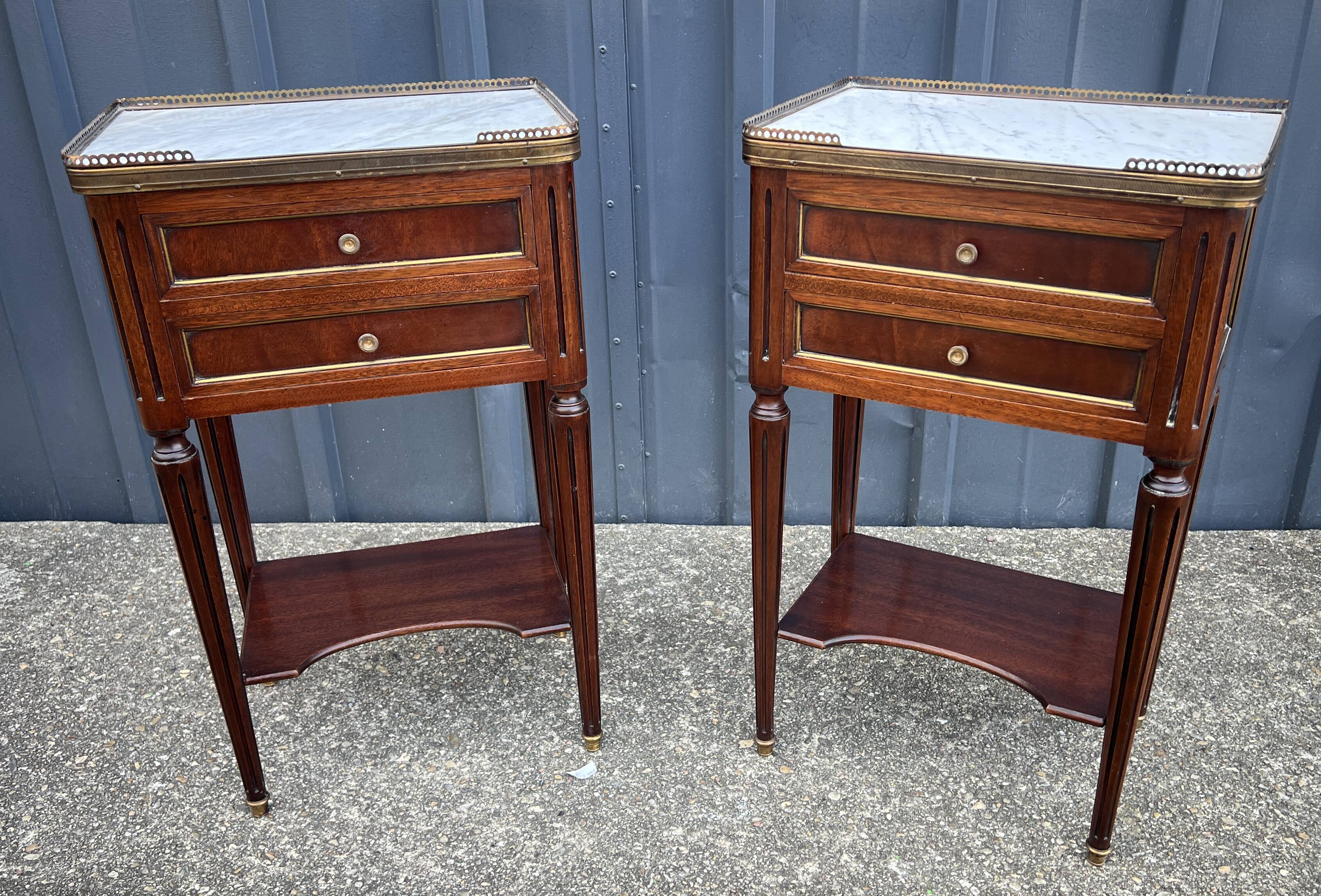 Pair of mahogany bedside tables, marble top, Louis XVI style