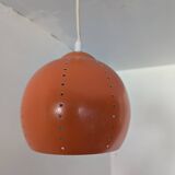 Pair of 70's globes in orange lacquered metal.