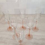 6 champagne flutes with pink stems