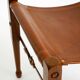 Rare 1990s safari stool with a teak frame and a seat made of brown saddle l
