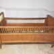 Children's bed made of wood and yellow scoubidou, 1950s.