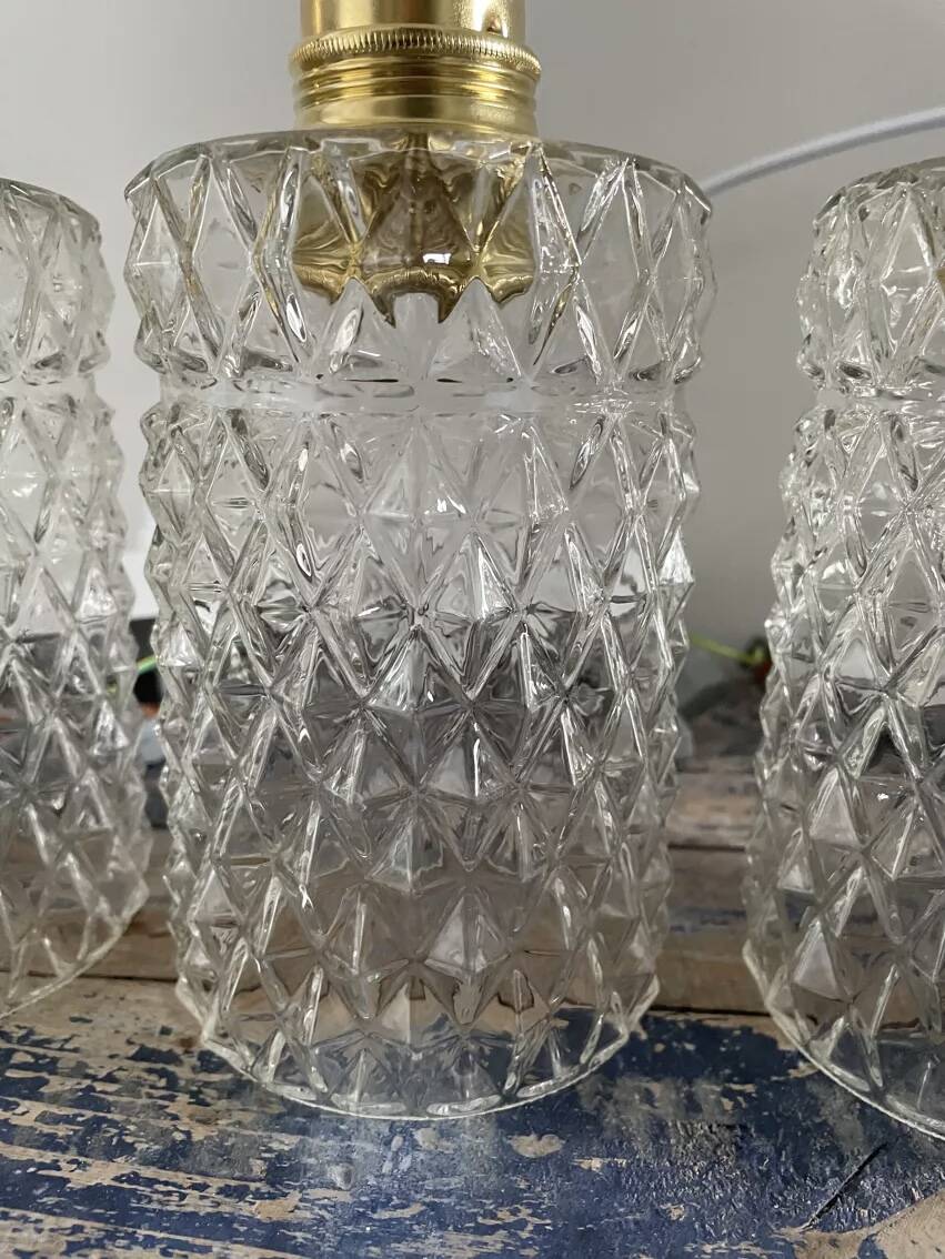 Set of three chiseled glass pendant lights of Scandinavian origin