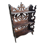 Small carved wooden shelf