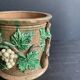 Large 19th century slip pot with vine decoration