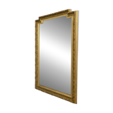 Large antique mirror from the Napoléon III era, finely carved and gilded with gold leaf.