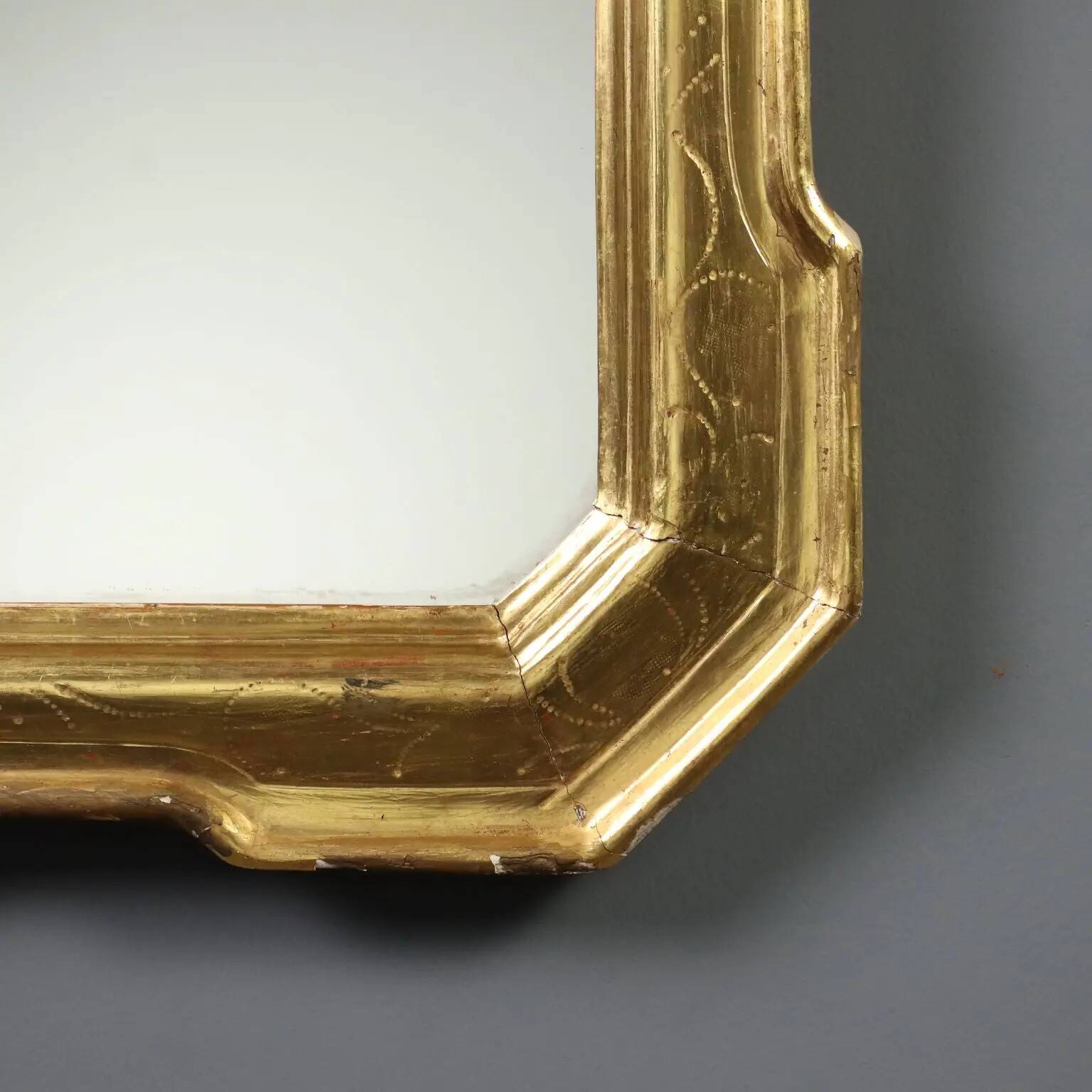 Antique cabaret mirror in gilded wood, Italy, mid-19th century.