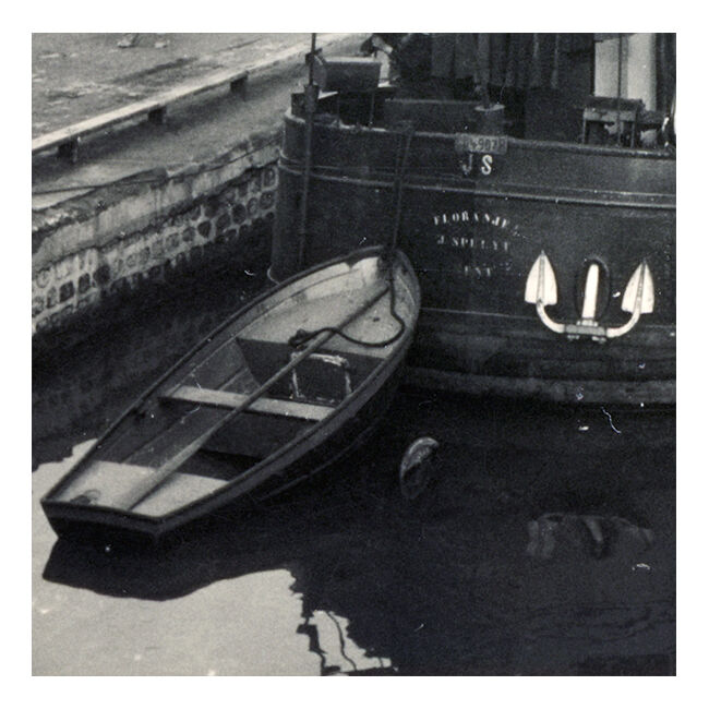 Ancient photo of a barge on a canal north of Paris