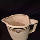 Old covered jug, vintage, geometric frieze with flowers and black trim.