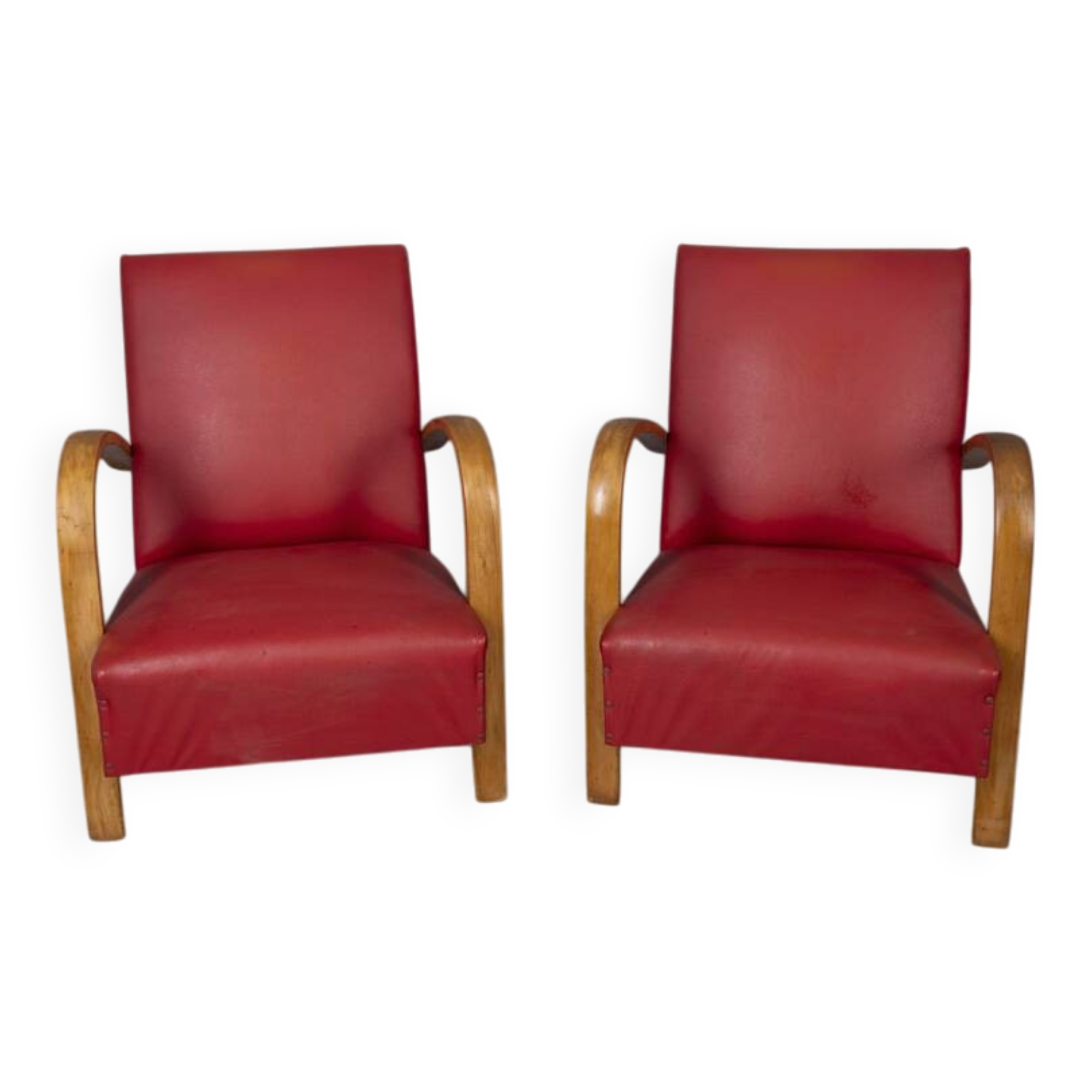 Pair of vintage 1950's armchairs in red leather, italian design
