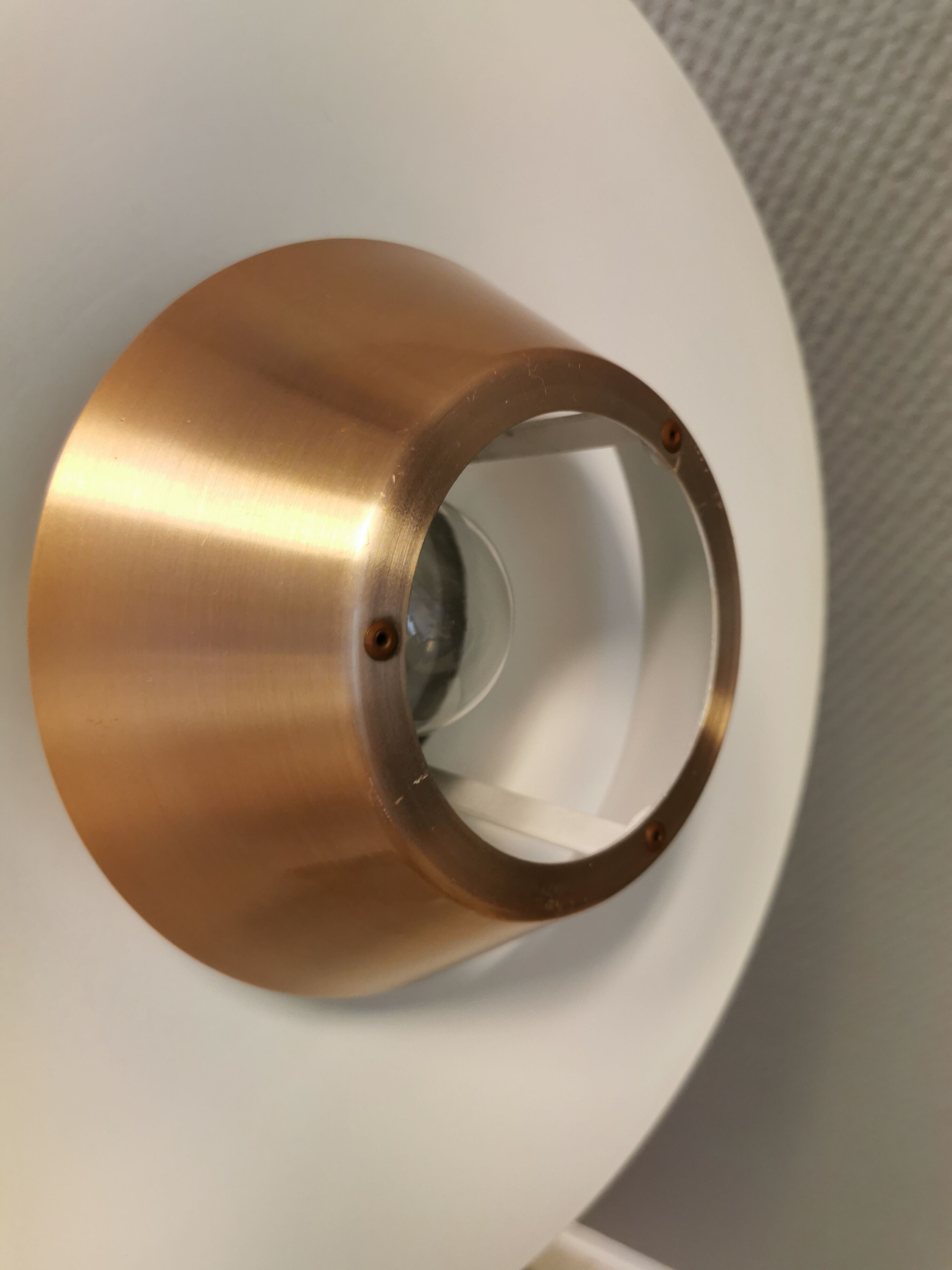 Ufo-like Danish hanging lamp, estimated from the 80s, made in copper colored lacquer.