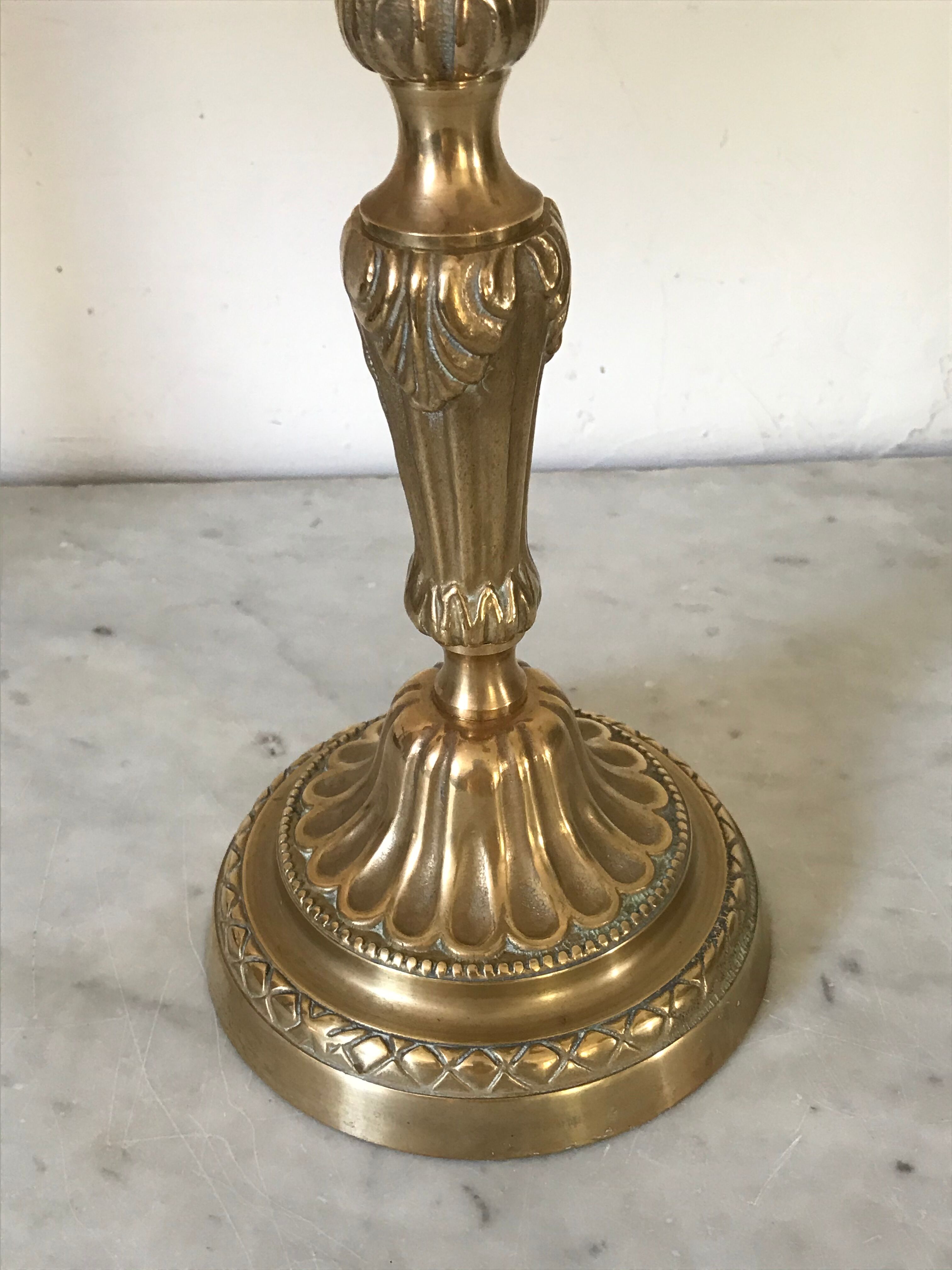 Pair of golden bronze candlesticks