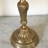 Pair of golden bronze candlesticks