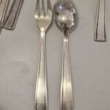 Set of silver dessert spoons and forks