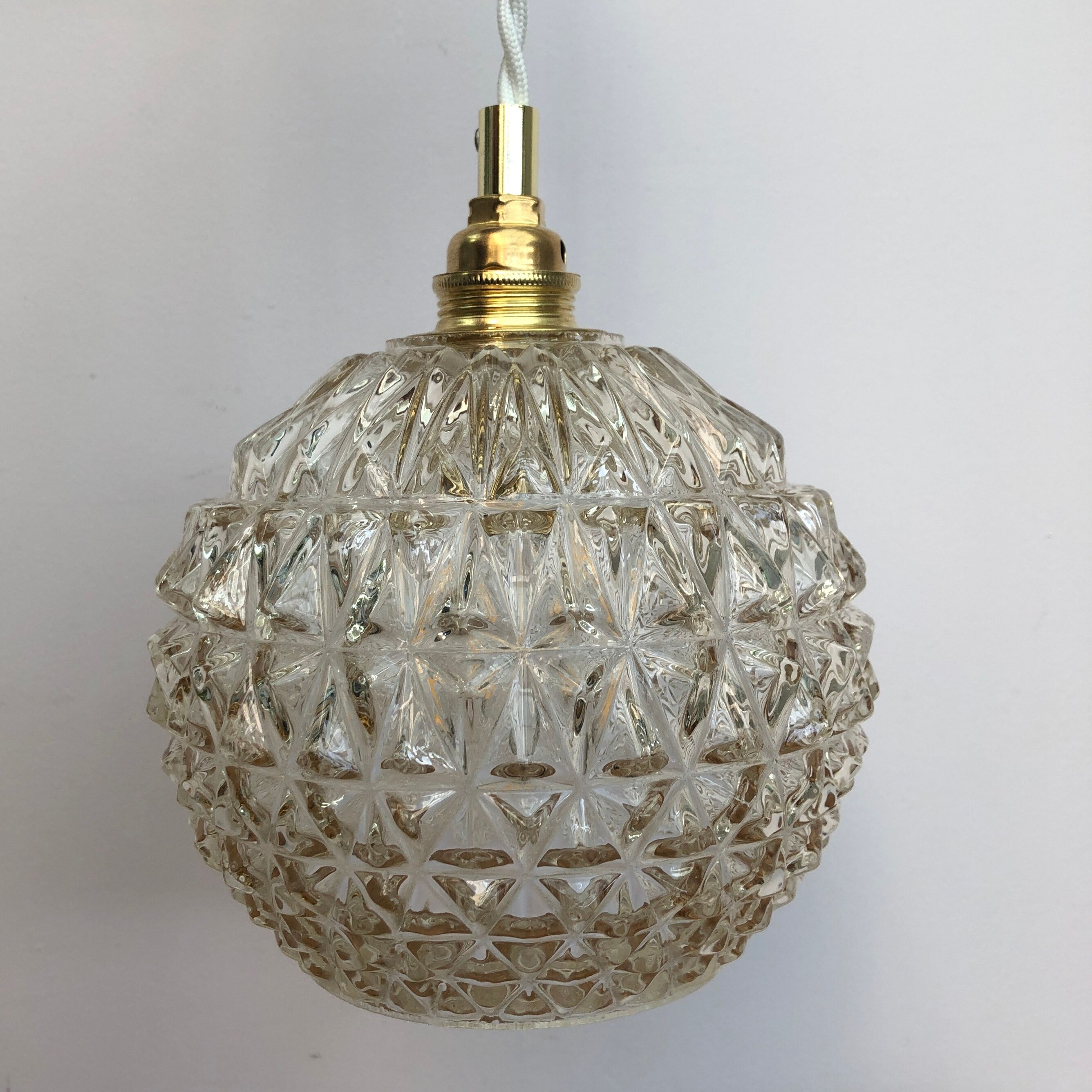 Vintage globe stroller in moulded glass