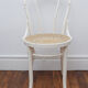 White wooden chair with cannage