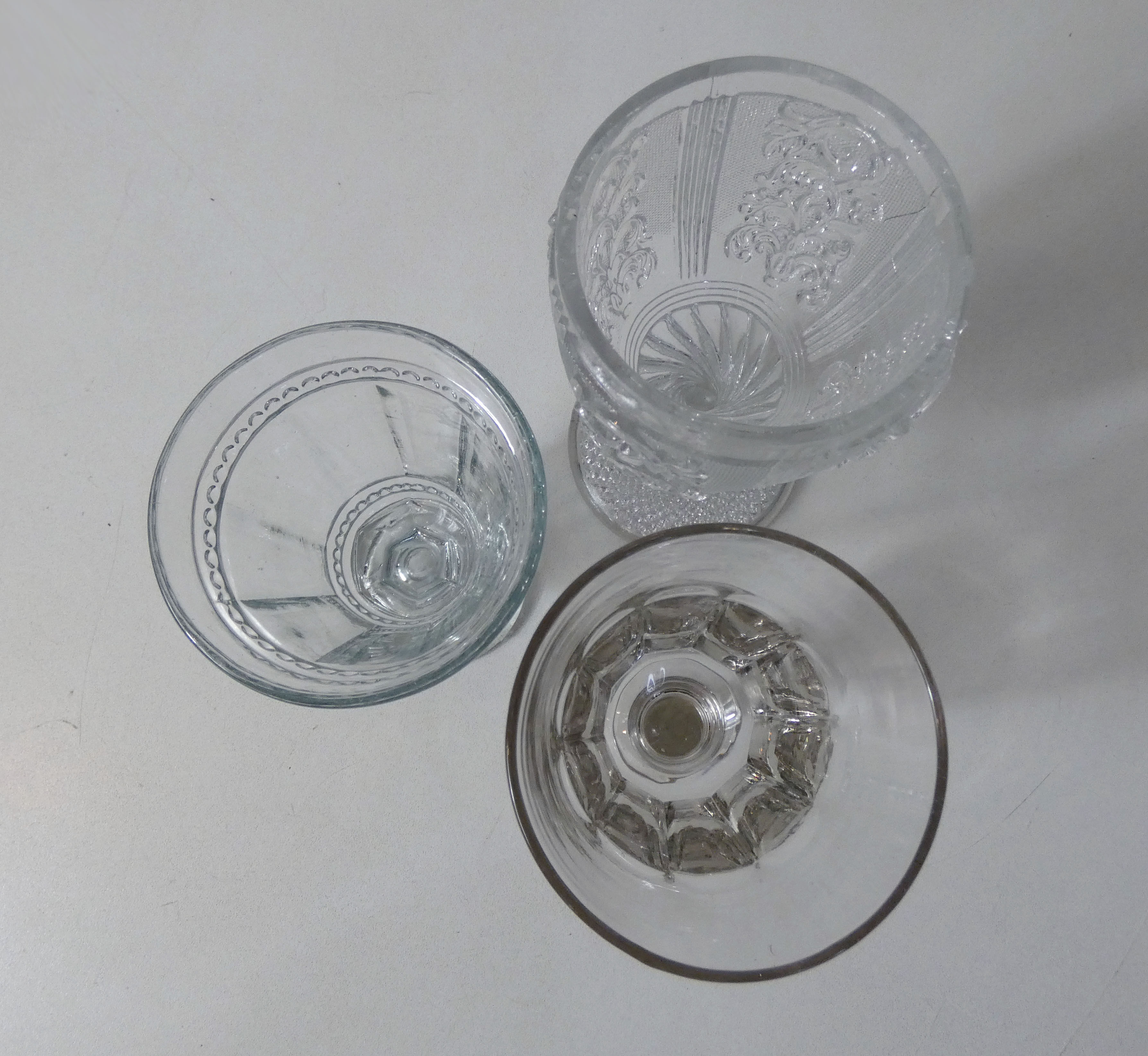 3 old stemmed glasses