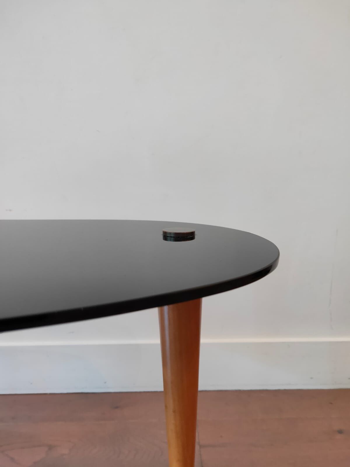 Black glass tripod table 1950