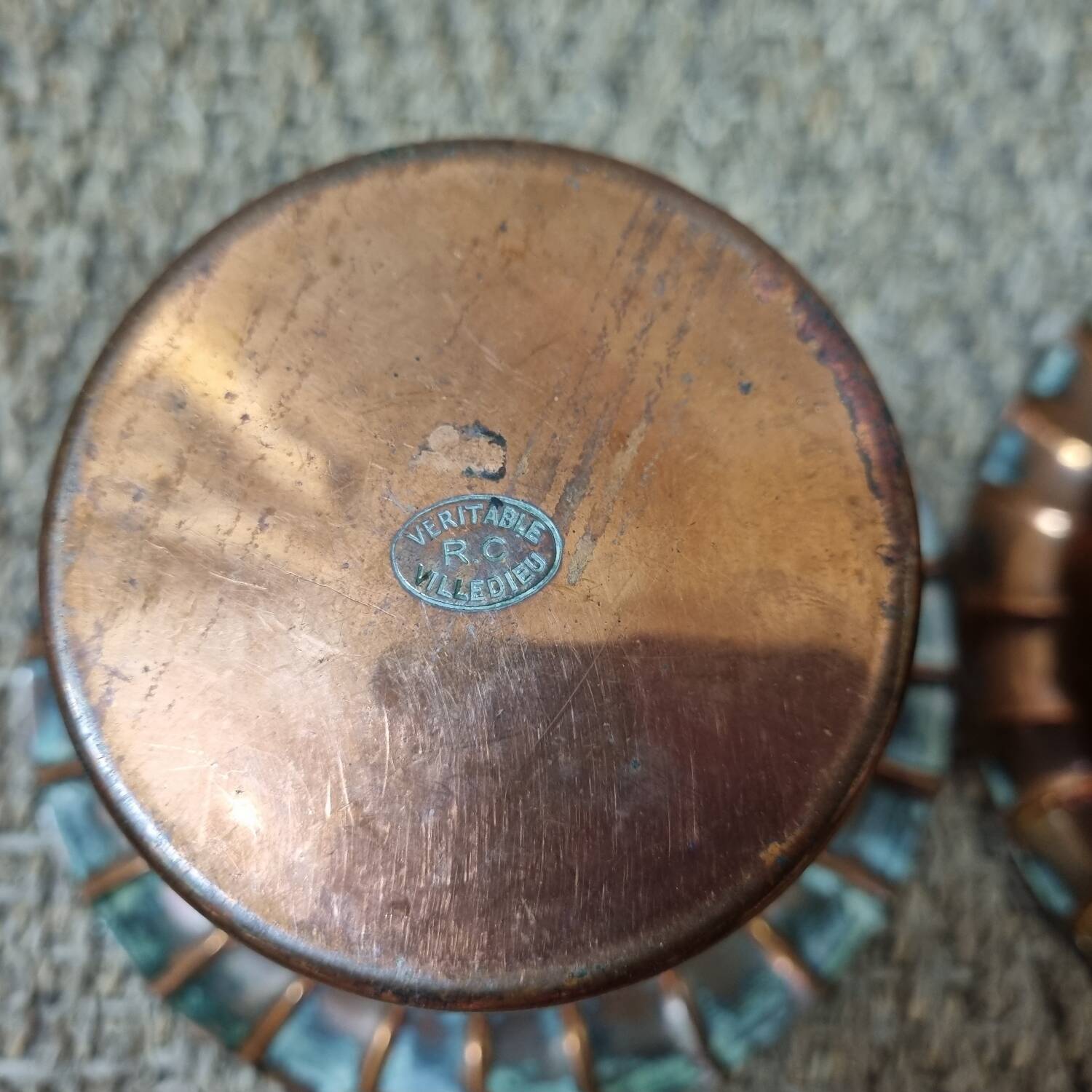 2 copper pot covers, 1960