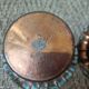 2 copper pot covers, 1960