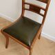 Set of 14 vintage chairs in solid wood and green leather.