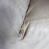 Leather armchair and cream-coloured foam, France , circa 1970