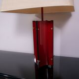 Red metal sculptural table lamp with oversized lamp shade circa 1980