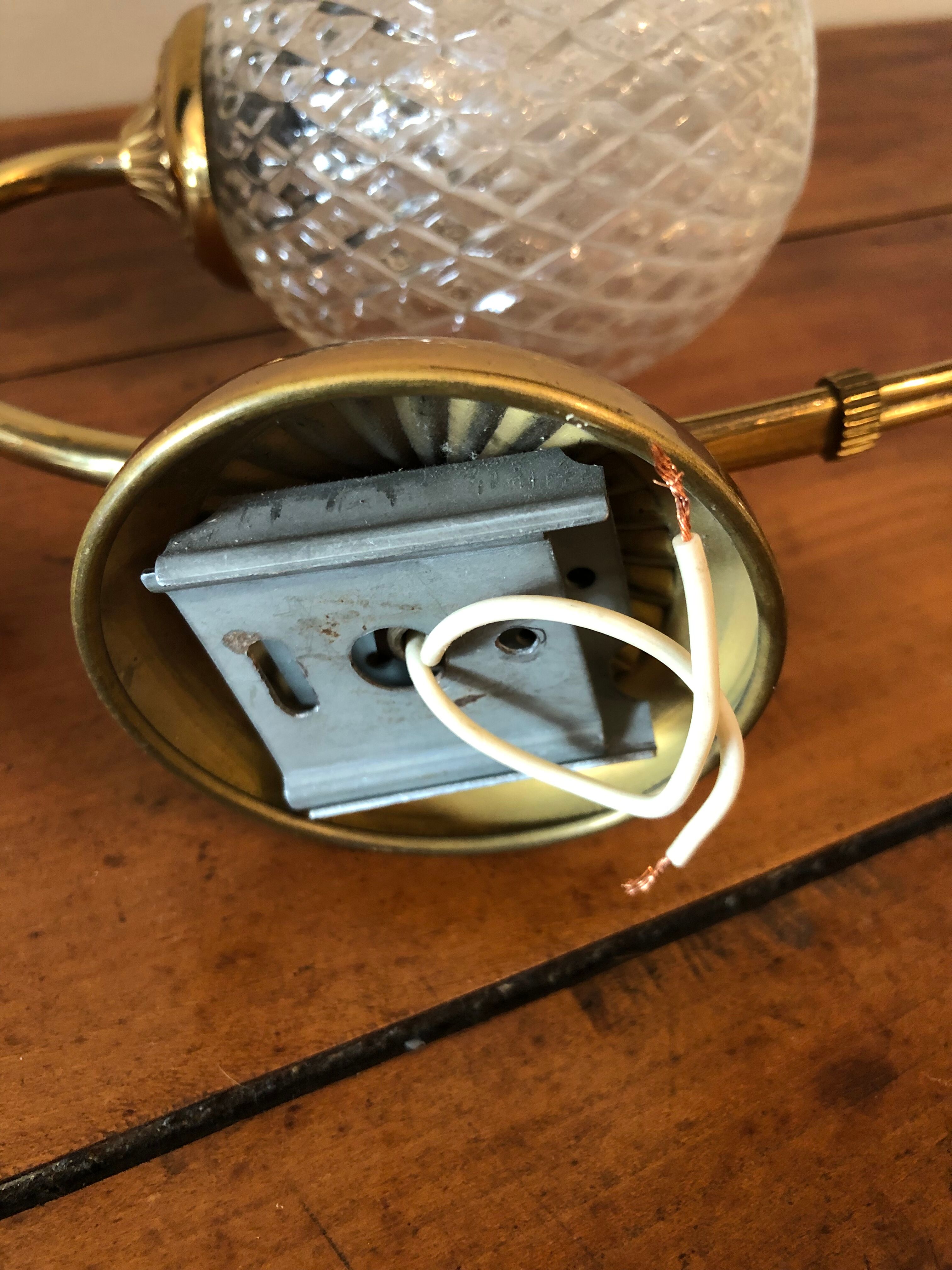 Duo of brass and glass wall lamps