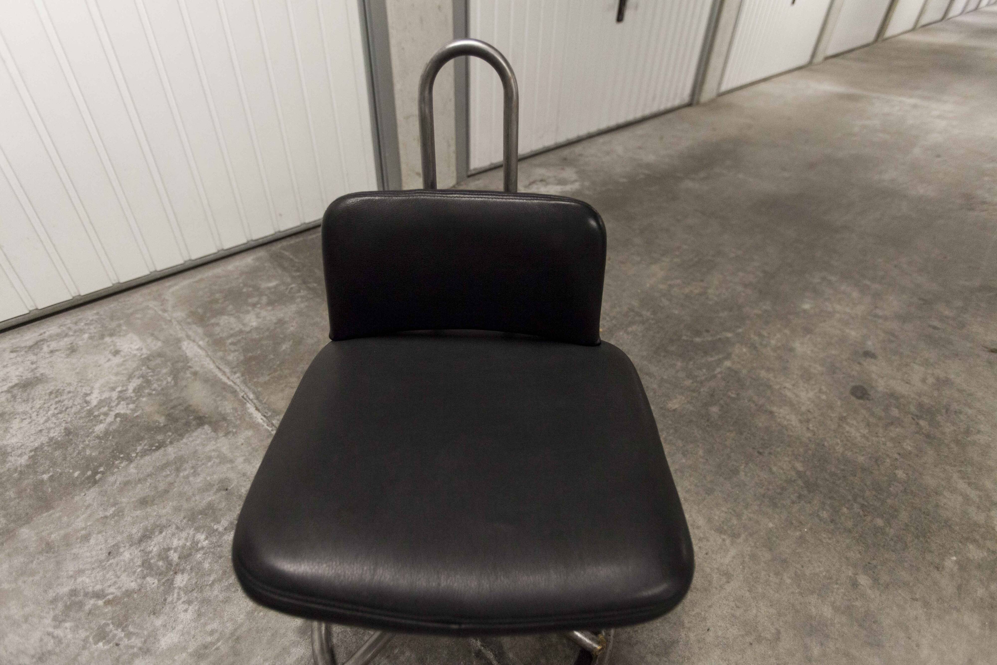 Pair of French Army telegraph operator's swivel chairs, new leather